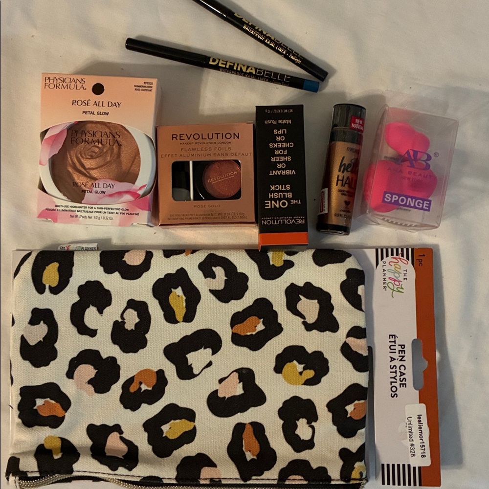 Makeup Revolution Set with Black, Brown, and Gold Accents
